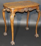 A Victorian oak card table, the rectangular top with counter dished corners and trumps carvings,