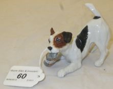 A Royal Doulton figure of a dog chewing a shoe, model No.