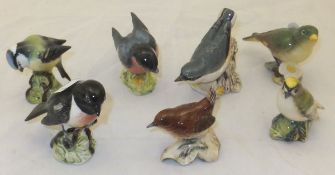 A collection of seven Beswick pottery bird figures to include "Stonechat" Model 2274,