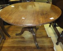 An early 19th Century oak tea table,