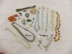 A box of assorted jewellery to include 9 carat gold dress ring, a heart shaped lock,