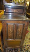A late Victorian rosewood and inlaid music cabinet