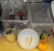 A collection of various glassware to include Kosta vase, four various decanters, drinking glasses,