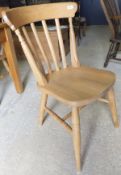 A set of eight modern stained beech slat back dining chairs in the Victorian manner