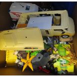 Three boxes of toys and games, to include a resin dragon, "Young Scientist", toy vehicles,