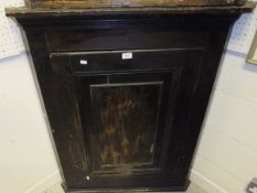 A 19th Century stained pine hanging corner cupboard