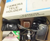 A box of vintage 35mm cameras and accessories and a collection of 35mm cameras including a Canon