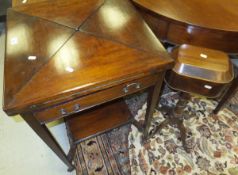 A Victorian mahogany envelope games table with single drawer on square tapering legs,