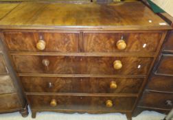 A Victorian mahogany chest of two short and three long graduated drawers on bracket feet