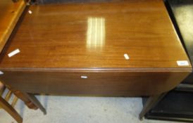 An early 19th Century mahogany drop leaf Pembroke table on square tapered legs to brass caps and
