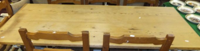 A pine refectory style kitchen table,