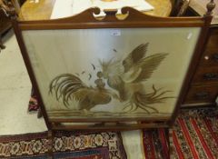 A mahogany and stained beech rectangular firescreen with silkwork central panel depicting cock