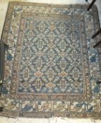 A Caucasian rug, the blue centre field with all-over decoration in pink and cream, within cream,