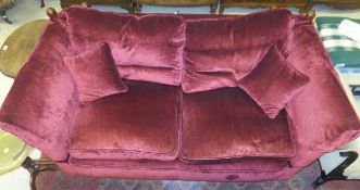 A modern Wesley Barrell knoll style sofa in burgundy velour upholstery