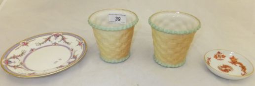 A pair of Royal Worcester blush ware miniature jardiniers, modelled as baskets,
