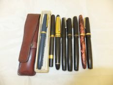 A collection of eight various fountain pens to include two Conway pens and a reproduction Mont