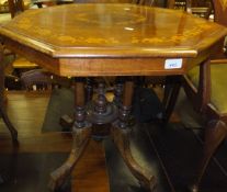 A octagonal mahogany centre table with marquetry inlay decoration to top,