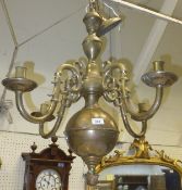 A brass four branch chandelier in the Dutch manner