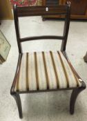 A set of four mahogany bar back dining chairs, and a further set of four ladder back dining chairs.