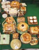 A large collection of pottery cottage ware items to include cruet sets, biscuit barrel, muffin dish,