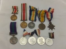 A collection of various medals to include 1914-18 British War medal,