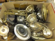 A box of assorted plated wares to include various cutlery, hot water jugs,