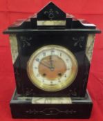 A slate cased mantel clock,