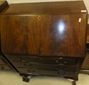 A mahogany bureau with three drawers,