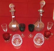 Two decanters, six cranberry coloured custards, an assortment of cut glass wares,