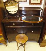 A modern mahogany chiffonier with concave front, a shield shaped toilet mirror,