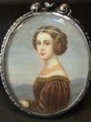 CIRCA 1900 ENGLISH SCHOOL "Young girl in 16th Century dress", miniature oil on ivory, oval,