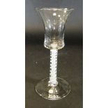 A mid 18th Century wine glass with waisted bucket shaped bowl to stem with double series opaque