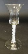 A mid 18th Century wine glass with waisted bucket shaped bowl to stem with double series opaque