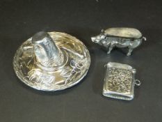 A silver pin cushion in the form of a pig (Birmingham, 1905),