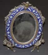 A late 19th Century French bronze and champlevé enamel decorated easel mirror,