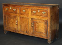 A George III oak enclosed dresser,