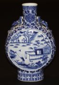 A Chinese porcelain moon flask, decorated in underglaze blue to both sides with figures in a