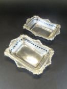 A pair of rectangular bonbon dishes with pierced scrolling decoration (by William Comyns & Son,