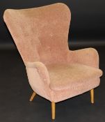 An Ernest Race (1913-1964) DA1 wing chair in a pale peach upholstery,