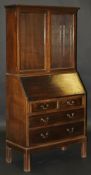 A mid 20th Century Gordon Russell mahogany bureau bookcase,