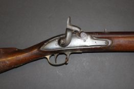 A 19th Century Brown Bess musket, hammer action, the barrel stamped "JPR/EXR/1850 - L136" verso,