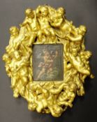 ITALIAN SCHOOL "Cherub on a cloud with ladder", oil on panel, unsigned, housed in a 19th Century