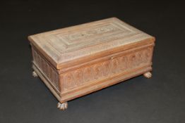 A circa 1900 Indian sandalwood and carved sewing box,