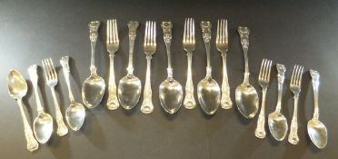 A collection of Kings pattern cutlery comprising three Victorian silver Kings pattern tablespoons