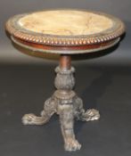 A Regency rosewood centre table by Gillows of Lancaster, the circular top with beaded edge, brass