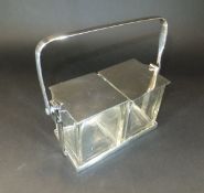 An early 20th Century electro-plated and glass two section preserve stand with patented opening