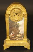 A 19th Century French gilt metal cased mantel clock in the Louis XVI taste, the domed top with egg