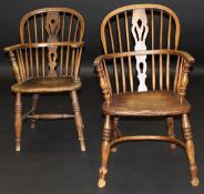A matched pair of 19th Century West Country ash and elm elbow chairs with spindle back and central