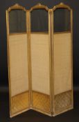 An Edwardian giltwood and gesso framed threefold vanity screen with glaze top section and pale