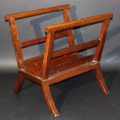 A Victorian mahogany folio stand, on sabre supports, 76.